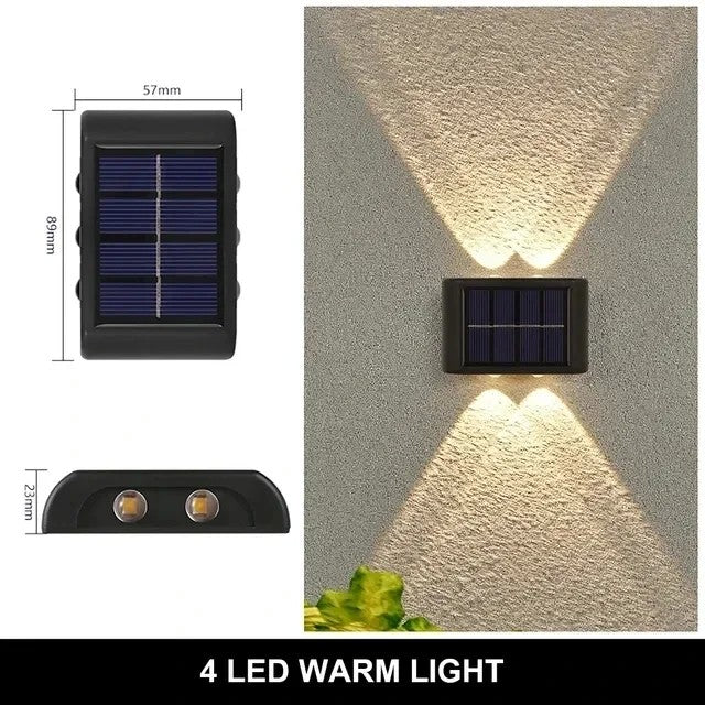 Ilumine seu espaço ao ar livre com estilo e eficiência com esta luminária solar automática, equipada com 4 LEDs de luz quente. Ideal para áreas externas, ela é à prova d'água e se fixa facilmente na parede, proporcionando iluminação sustentável e elegante durante a noite.