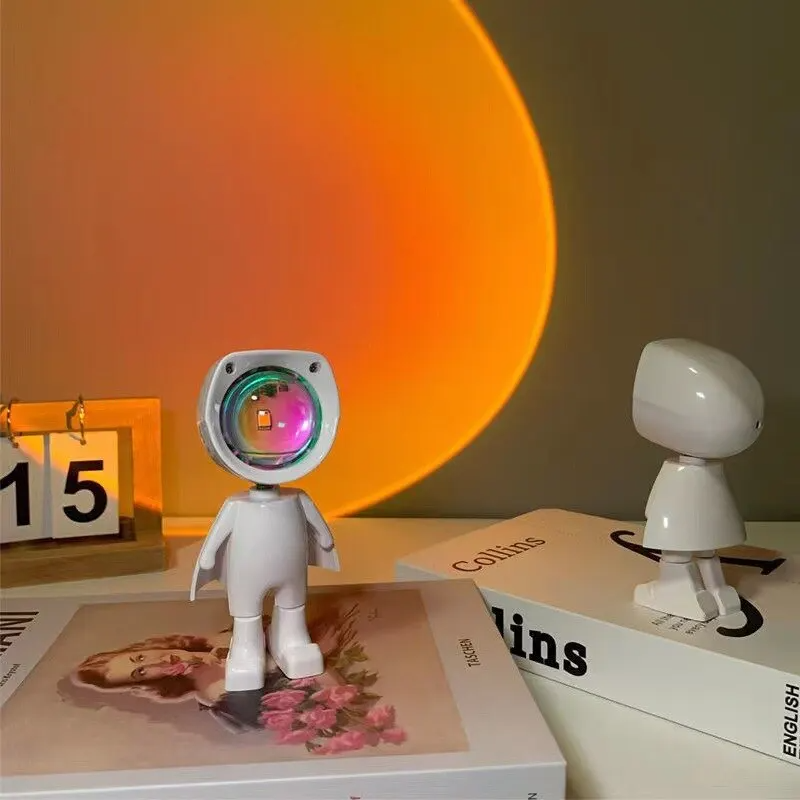 Explore o universo em sua casa com a Luminária Astronauta: 7 Cores Vibrantes, Bateria Recarregável, Design Inovador.