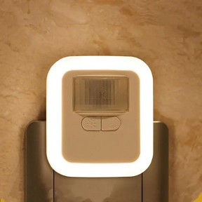 Luminária de Tomada com Sensor de Presença e com Adaptação de Tonalidades de Luz