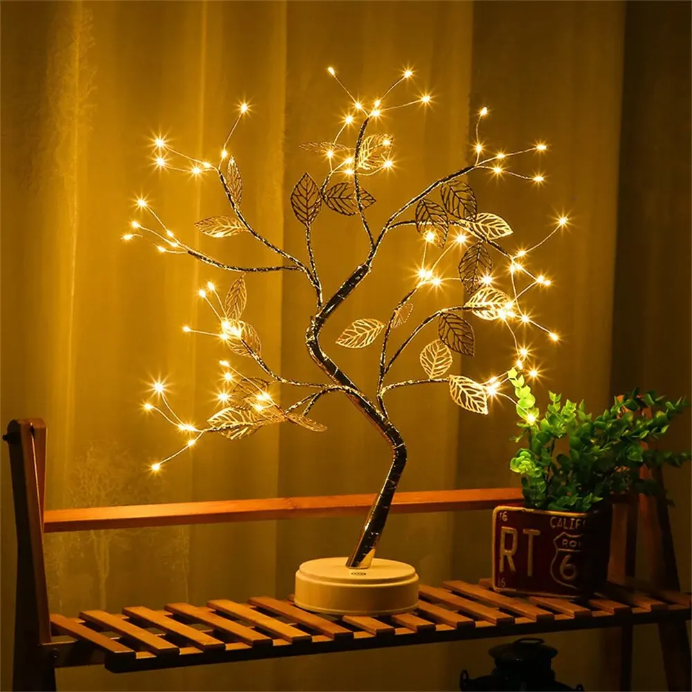 Luminária de Mesa LED em formato de folha, proporcionando um toque mágico ao ambiente com suas luzes de fadas delicadas. Alimentada por USB, é perfeita para decorar qualquer espaço com elegância e charme natural.