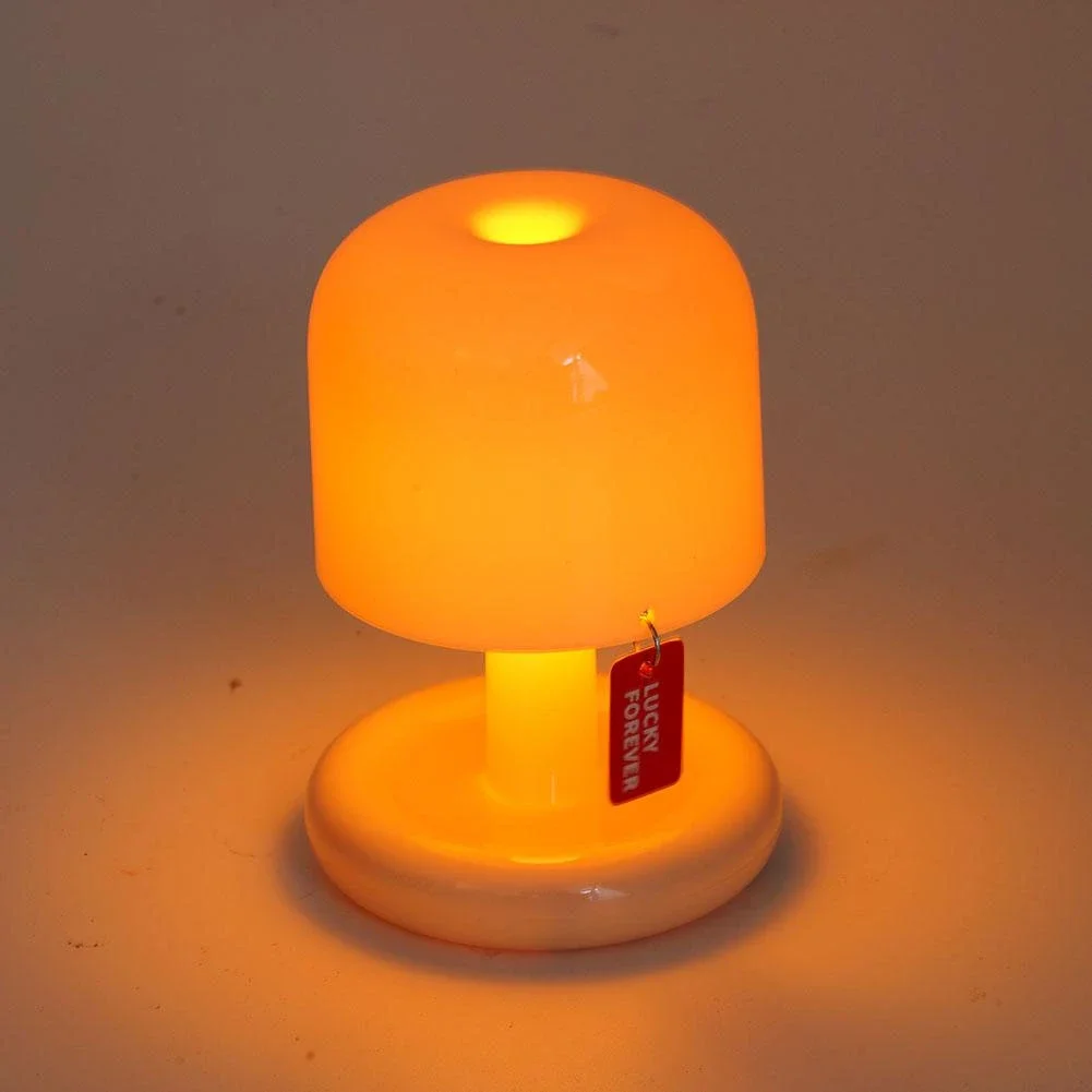Ilumine seu ambiente com estilo com esta luminária de mesa LED em formato de cogumelo, ideal para uma decoração moderna e sofisticada.