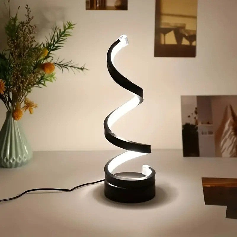 Luminária de mesa LED espiral com design moderno e elegante; ajuste de 3 níveis de brilho para iluminação personalizada.